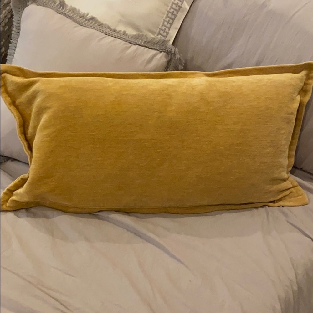 Gold lumbar pillow with zip off cover